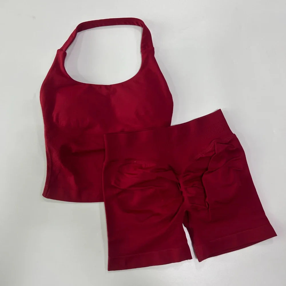 Red halter top and shorts set on a white background