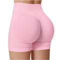 Pink high-waisted shorts on a white background